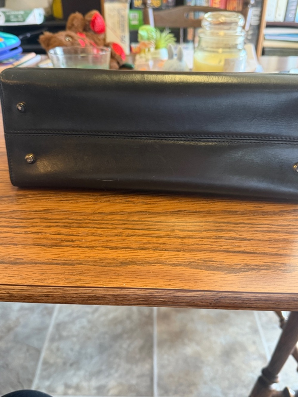 Vintage Bally black leather handbag with gold-tone turn-lock closure. - Picture 14 of 14